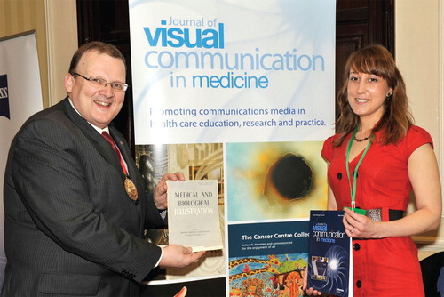 Figure 9. The Journal communication stand with IMI Chairman Ross Milligan and Editor Carly Betton.