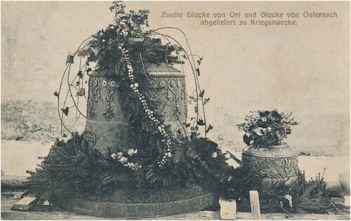 Figure 1. World War I-era postcard showing the church bells of St. Martin (left) and Osternach (right), both Inn District, Austria, being farewelled en route to be melted down for the war effort (Postcard ca. 1917, Anton Hoftetter, publisher; postcard in possession of DHRS).