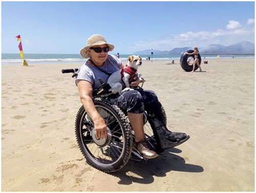 Figure 1. Research participant supplied photo, using AT to access beach with their dog.