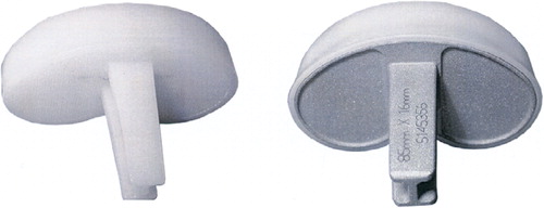 Figure 1. All-polyethylene (left) and metal-backed (right) tibial components of the AGC prosthesis. Both have non-modular, identical articulating surface and similar geometry.