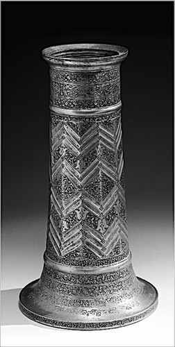 Figure 15. Kashan-Mashhad torch stand. Astan-i Quds Razavi, inventory number not available. c. 1560–1600, Iran (possibly Kashan). Brass; cast and engraved;.h. 43 cm. After Shayistahfar and Muhammadian, “Barrasi-yi nuqush,” 59, fig. 6.