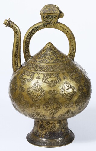 Figure 11. Ewer inscribed with animal motifs. Victoria and Albert Museum, inv. no. 458-1876. 1011/1602–3, Iran. Brass; cast and engraved; h. 32 cm, d. 19 cm. © Victoria and Albert Museum.