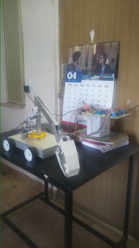 Figure 4. Robotic arm picking up light objects such as paper balls, etc.