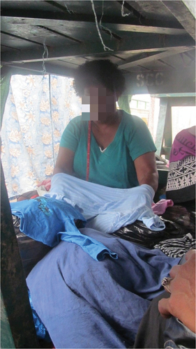 Figure 4. Selling clothes under tables at Suva Central Market.