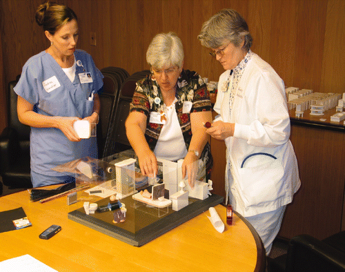Figure 6. This photograph shows nurses co-designing the ideal future patient room using a three-dimensional toolkit for generative prototyping (Sanders 2006c).