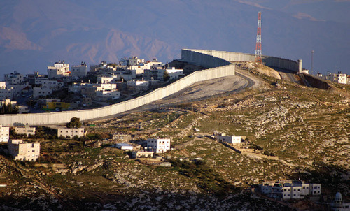 Figure 2: Jerusalem, 2008 Israel’s wall in the West Bank was first constructed in 1992 during the Oslo Accords. That series of small concrete slabs expanded starting in 2002 when Israel first broke ground for what is now a near-continuous barrier close to 500 miles long.