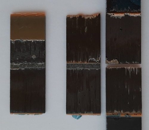 Figure 9. The fracture surfaces of specimen DSJ-crack 4. Parent adherends are shown far right; pre-cracked and non-pre-cracked strap parts are shown in the left and middle, respectively.