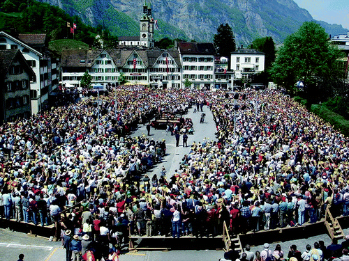 Figure 9. Direct democratic town meeting at Canton of Glarus, Switzerland in 2006.