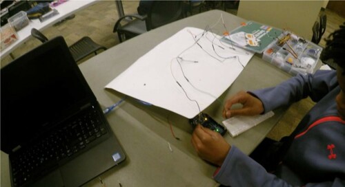 Figure 5. Student wiring a kinetic e-painting.