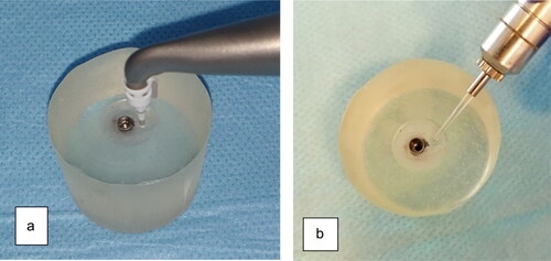 Figure 2. (a) Application of air powder abrasive device (shown in defect angulation of 30°). (b) Application of Er:YAG laser (shown in defect angulation of 30°).
