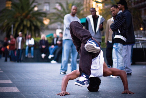 Figure 3. A segment of hip-hop photography takes as its subject matter the poses and imagery of b-boying and b-girling. Images by Nate Bolt (2007). B-Boy. https://creativecommons.org/licenses/by-sa/2.0/legalcode.