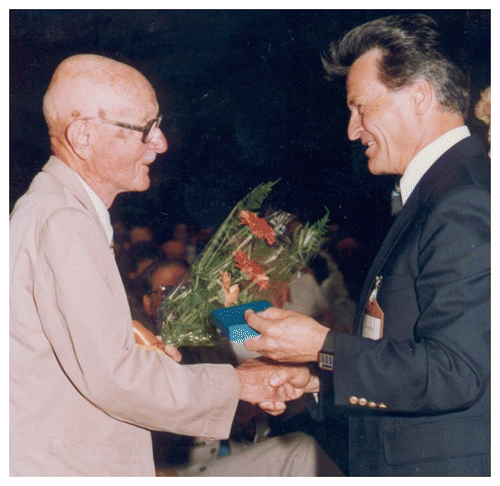 Figure 3. Donhoffer (90 y-old) receiving the Medal of the Hungarian Physiological Society from its president, Emil Monos.