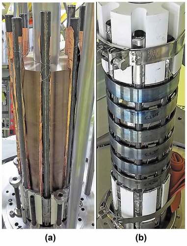 Fig. 1. KRUSTY core assembly. (a) Heat pipes fit within the slots in the HEU UMo fuel. (b) Core after the installation of the Haynes 230 rings that clamp the heat pipes to the fuel (via interference fit). White BeO axial reflectors seen on top and bottom. Some parts in the photographs are part of the temporary assembly fixture, which is later removed.