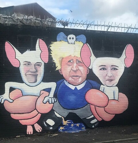 Figure 5. A cartoon depiction of Boris Johnson MP, Arlene Foster MLA (left) and Michelle O’Neill MLA (right), taken in west Belfast, September 2019.