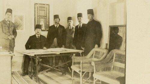 Figure 2. Hüsnü Bey, Mimar Kemaleddin, Rushdi Imam al-Husseini, Cemal Bey, and Mehmet Nihat Nigizberk at Al-Aqsa Mosque restoration office in Jerusalem, date unknown. SALT Research, Istanbul.