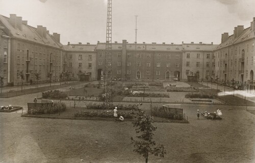 Figure 14. The courtyard, which extends over the whole block, is surrounded from the left by a courtyard, 1931 [Photo by E. Koponen, hkm.561995AE, Helsinki City Museum Archive].
