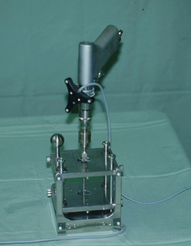 Figure 5. The drill wire is calibrated in the calibration station. A trackable reference frame is fixed on the drilling handle.