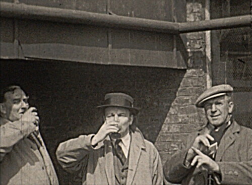 Figure 2 A rare moment of levity. Veterans drinking at Vimy Ridge (Page).