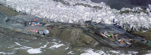 Figure 8. Example of made ground and mine infrastructure next to the Davidov Glacier prior to extensive supraglacial spoil dumping and ice excavation (SRK Consulting).