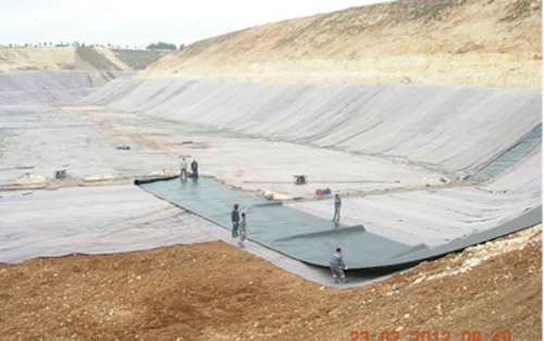 Figure 5. Geomembrane overlain by compacted clay for lining the landfill area in Gaziantep City.