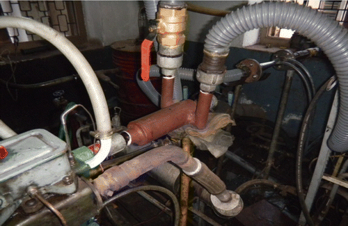 Figure 3 Parallel flow gas entry carburettor for producer gas induction fitted to the engine.