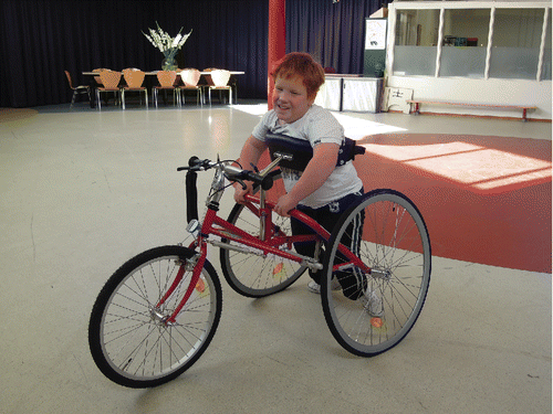 FIGURE 1.  A picture of a boy using the racerunner.