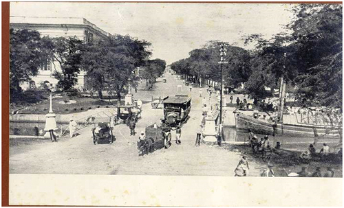 Figure 5. Semarang River and Berok Bridge in 1920, and Het Groote Huis (Residential Office), building on the West Side of Semarang River was built in 1864. This building was the residence office in the colonial era and is now used as the Finance Office Building. The photo also depicts delman, cart, and street sweeper car and people cleaning the sidewalk.
