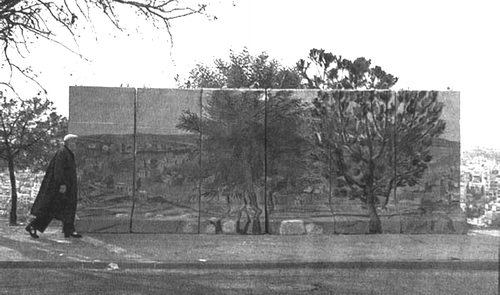 Figure 1  Decorated defensive wall on Anafa Street, Gilo, 2001 (Photograph by Alex Libek, appeared in Haaretz, March 1, 2001).