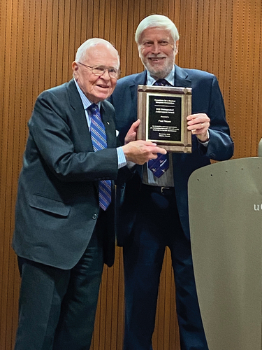 Figure 1. Former Canadian Senator Douglas Roche presenting the author with the “Distinguished Achievement” award.