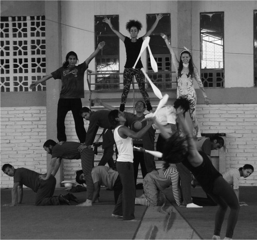 Photo 9. Juggling, clowning, acrobatics, and collective acrobatics (pyramid) by Circo Social Quito and Circo Social Cuenca volunteers in 2013 rehearsing for a show at the inauguration of the big tent in Cuenca (2013). Photo credit: B. Ortiz Choukroun.