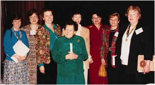 Figure 1. Dr Tikvah Alper in the foreground with members of the Radiation Research Society (from left to right: K Held, P Olive, J Denekamp, S Wallace, K Mason, M Oleinick and H Evans) after her special lecture to the Radiation Research Society, Dallas, 1993. Photograph by Bill Osborne, from the Archives of the Radiation Research Society.