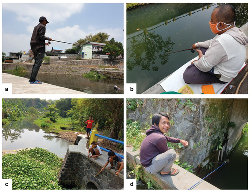 Figure 3. The activities of Indonesian anglers. (a) fishing in the reservoir; (b) fishing in the pond; (c) fishing in the river well-vegetated with invasive water hyacinth (Pontederia crassipes); and (d) fishing in the brook.
