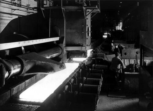 Figure 8. Loewy slab shear and run-out table motors on the slabbing mill at John Summers & Sons, Shotton, commissioned in 1940. The rotors of the squirrel cage motors are coupled directly to individual rollers. (Shotton Records Centre, Tata Steel.).