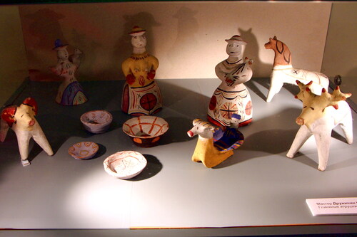 Figure 1. Clay toys by Ivan Druzhinin, from the collection of the Kargopol State Historical, Architectural and Art Museum. Three female figures and three animals (a elk, a deer, and a goat). Photo by V. Kobyshcha.