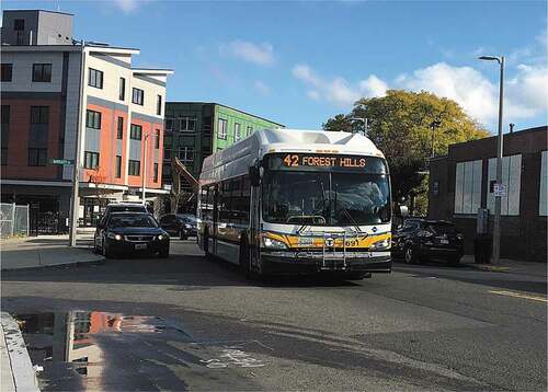 Figure 1c. A bus departs Nubian Square, Roxbury, Massachusetts. Credit: Beantowndude316 from USA, CC BY 2.0 <https://creativecommons.org/licenses/by/2.0>, via Wikimedia Commons