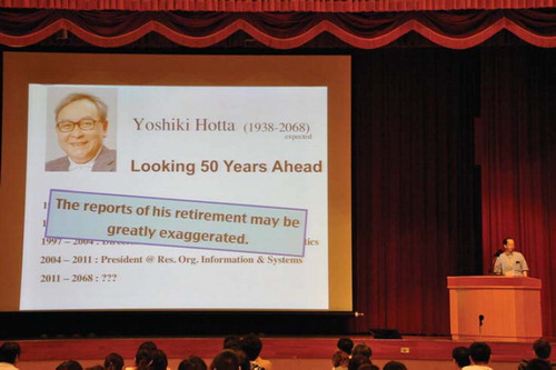 Figure 1. Yoshiki Hotta being introduced as an honorary guest speaker at the 1st Asia-Pacific Drosophila Research Conference (2011, Taipei).