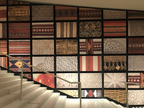 Figure 3: Wall decorations along the staircase connecting the “life in the desert” gallery to the “life on the coast” gallery, National Museum of Qatar. Mitchell photograph, 29 May 2019.