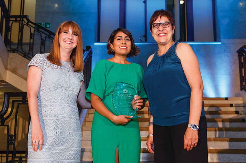 Figure 2. Receiving the Top 50 Women in Engineering prize from the Women's Engineering Society.