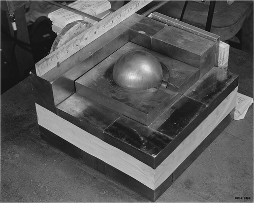 Fig. 12. Plutonium sphere with WC reflection. This picture was taken as part of documentation related to the criticality accident on August 21, 1945 in which Harold Daghlian was killed (CitationRef. 80)