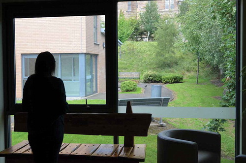 FIGURE 13  Students encountering the “Sanctuary” room in Gartnavel’s new hospital building. Photo by Hester Parr. (Color figure available online.)