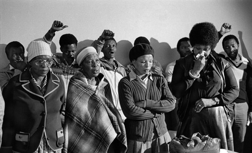Figure 6 Pauline Moloise, two women and Winnie Madikizela Mandela with other mourners after the execution of Benjamin Moloise, 1985. Photograph by Gille de Vlieg, reproduced courtesy of the photographer.