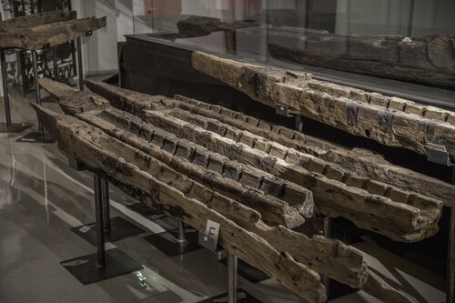 Figure 5. Wooden carriage beds for iron guns salvaged from the site now exhibited in Blekinge Museum. Several more guns are probably still to be found on the wreck. Guns for the king’s new ships were important and there are records from 1487 in Copenhagen of a ‘Powder Master’ named Hans and from 1493 of a ‘gun caster’ named Chort. Both were employed by John (Barfod, Citation1990, p. 198). (Photo: Brett Seymour, The Gripshund Project).
