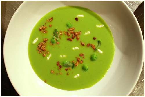 Figure 7. “Peas ‘n’ bees”, a dish developed at the Nordic Food Lab: fresh pea soup, bee larvae (some poached, some fried), blanched peas, lovage and fermented bee pollen (“bee bread”).