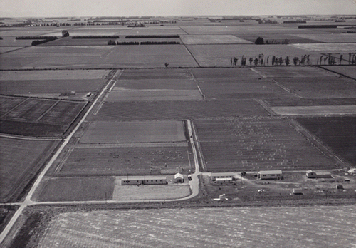 Figure 2  Overview of the Winchmore Irrigation Research Station during 1952 depicting the administration, laboratories and service buildings with the response of pasture to irrigation trial in the distance immediately adjoining the left-hand most buildings.