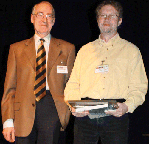 Figure 1. Geoffrey Luckhurst presenting the 2010 Luckhurst–Samulski Prize to Antal Jákli at ECLC 2011 in Maribor, Slovenia.
