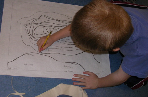 Figure 2. Preparing topographic map for tracing and transfer.