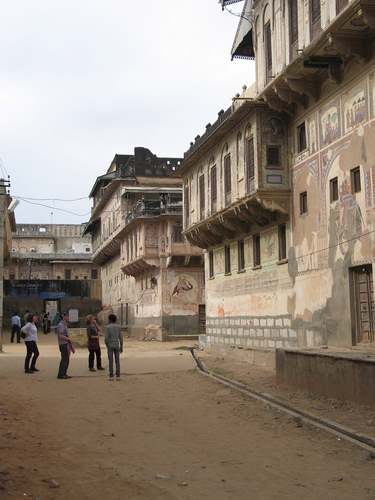 Figure 2. A Merchant Havelis in Nawalgarh, Rajasthan, grand mansions built by wealthy merchants in the early 18th century, with intricate frescoes and murals, depicting everyday life, folk legends, and religious themes. However, as Vibha Upadhyaya, noted in 2017 lack of maintenance has left many buildings in a dilapidated state and heritage is being lost.Footnote1 (photo M Dawson).