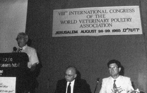 Figure 13.  Dr Y. Samberg opening the VIIIth Congress in Jerusalem, with Dr L.N. Payne (Secretary/Treasurer) in the centre and Dr P.M. Biggs (President) on the right.