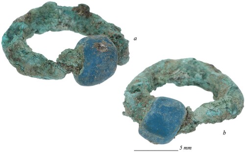 Figure 4. A copper-alloy earring with a single glass bead from Maryam Anza (170.95, Grave 9) (photograph by J. Then-Obłuska).
