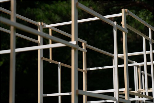 Figure 3. Photograph of 107 m3 Pavilion, made of over 500 pieces of around 2 cm X 2 cm, both sides white painted lumber. Photograph courtesy of author.